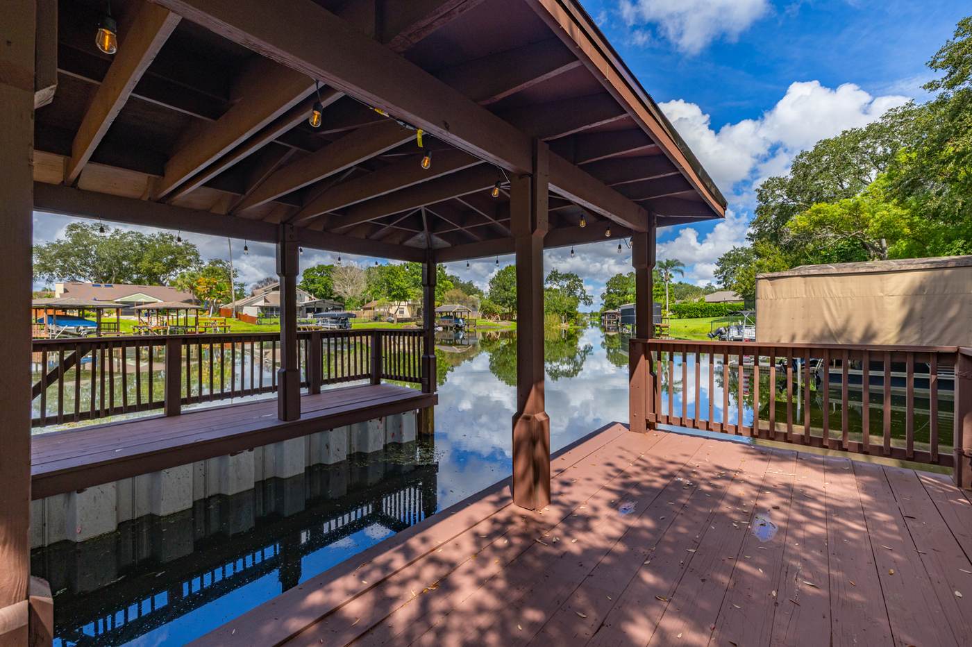 Covered boat dock on the canal to the Conway Chain of Lakes at 3625 Waters Edge Dr, Belle Isle Florida