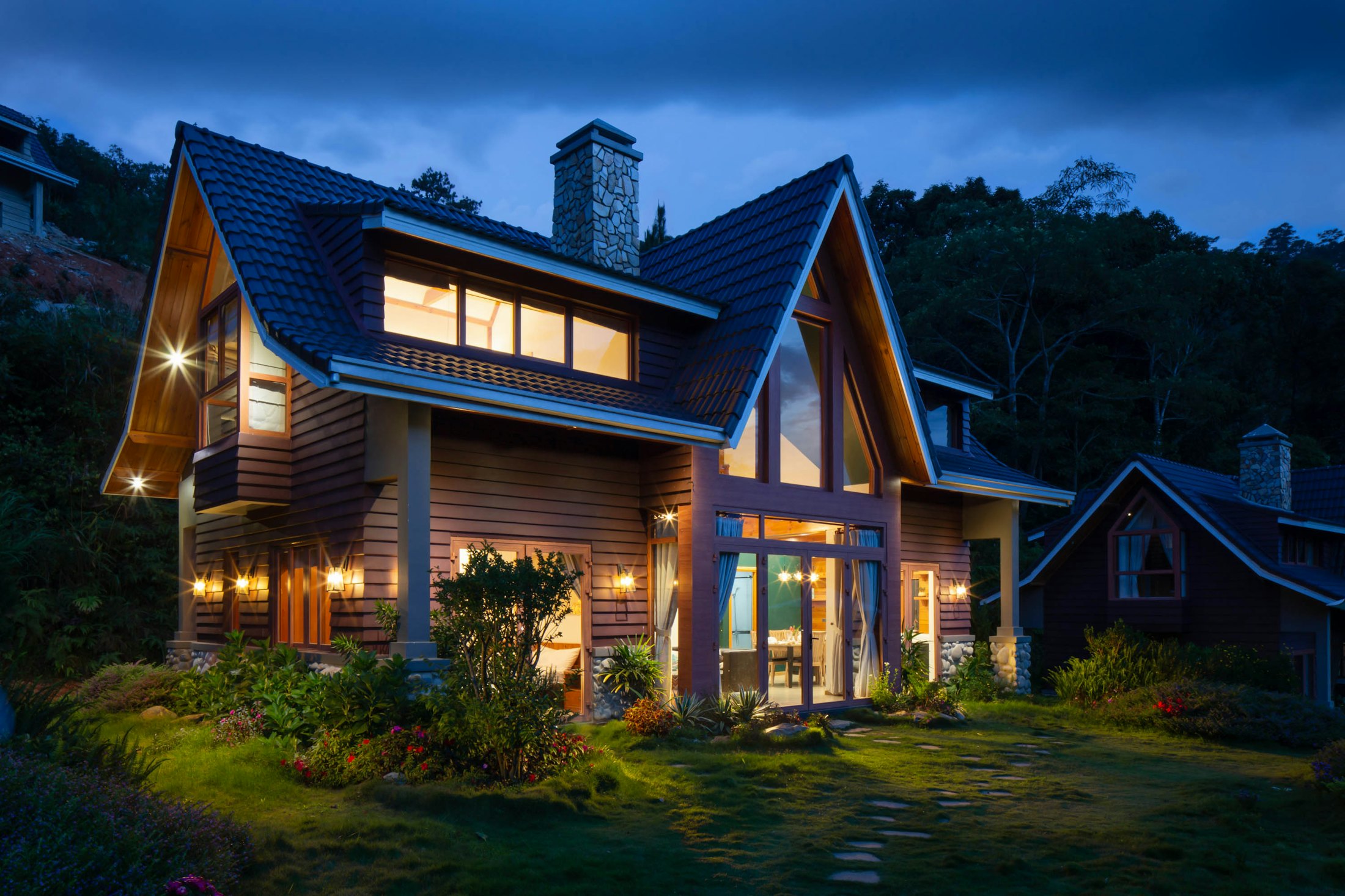 Craftsman-style home with landscaped front yard
